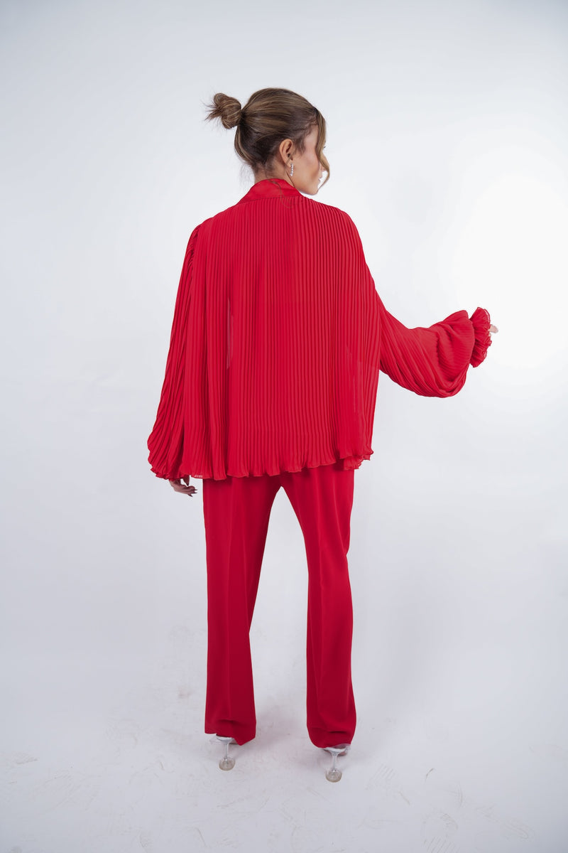 Pleated top with ruffles